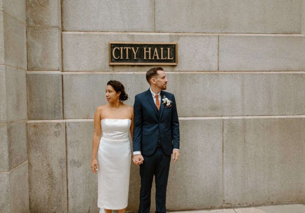 Bride and groom outside Chicago City Hall after elopement